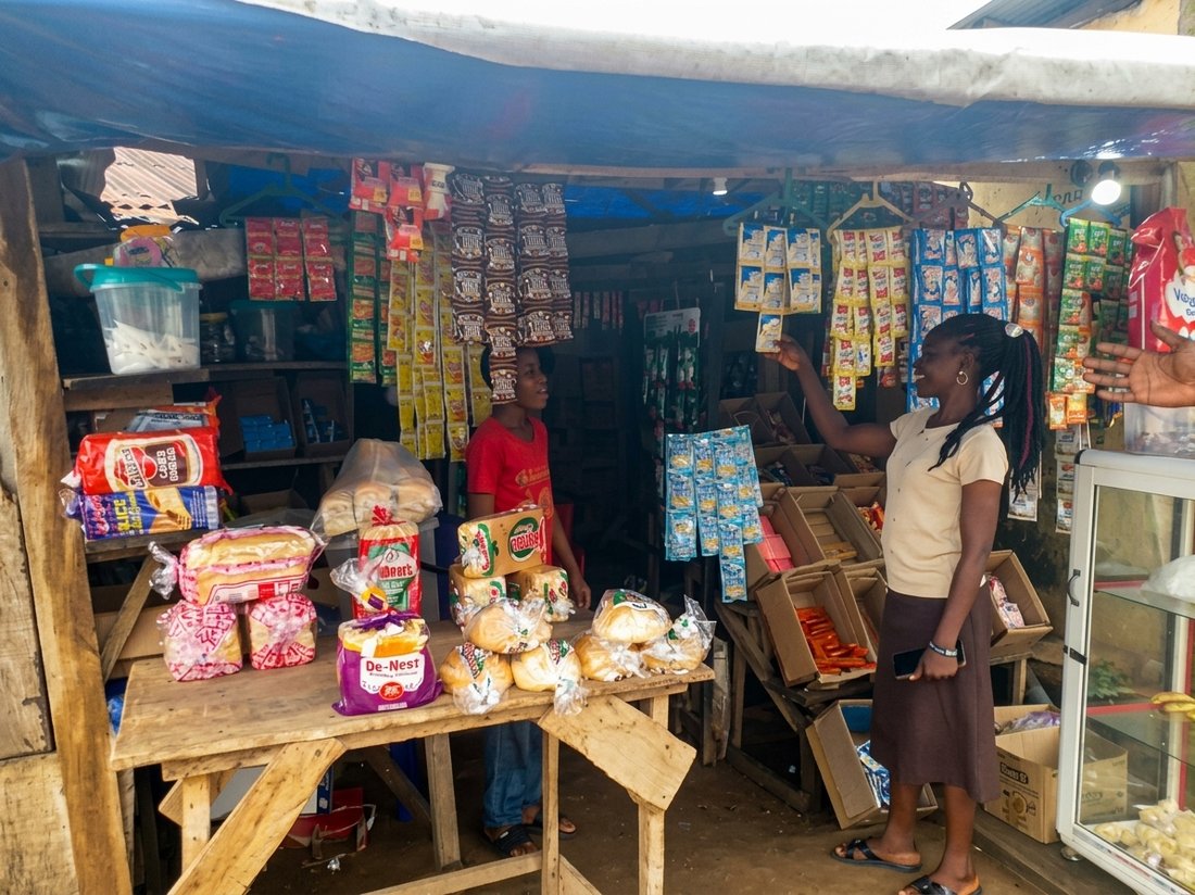 A shop owner banked by Nri Microfinance Bank